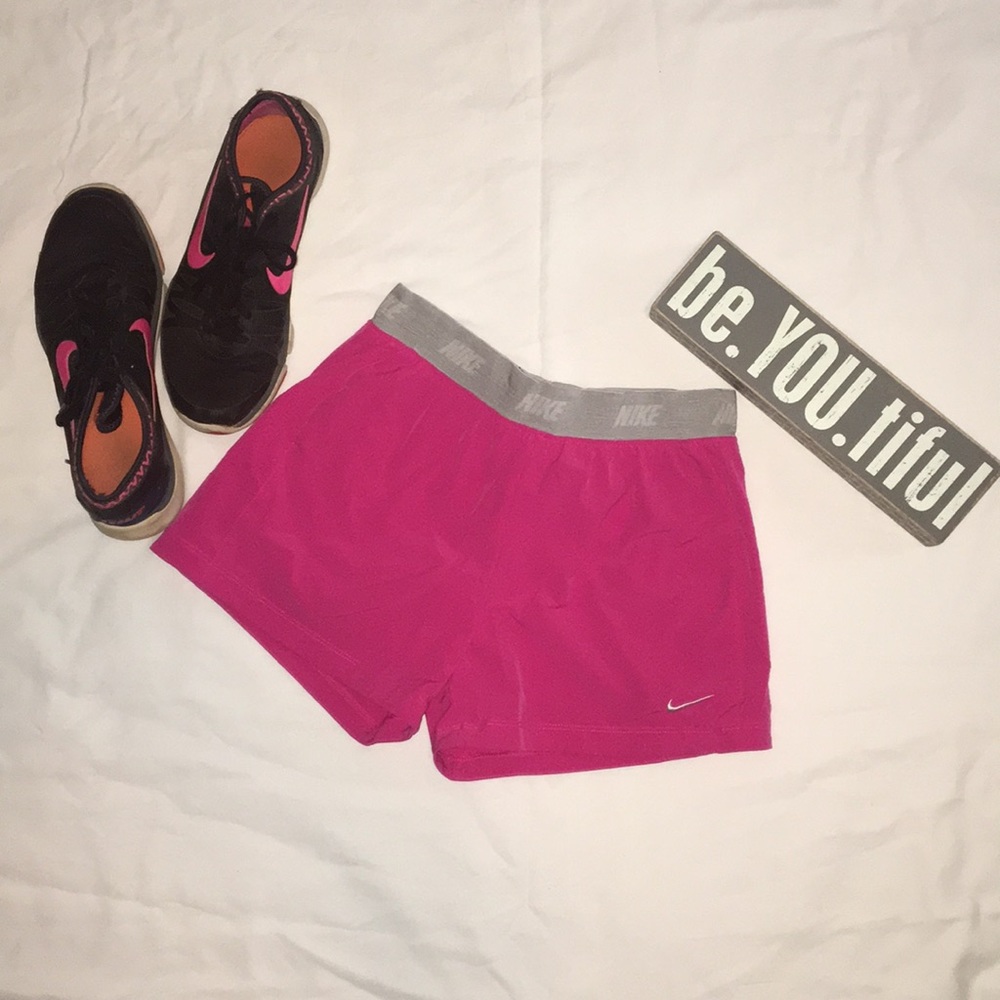 Pink Nike Drifit running shorts